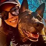 Smile, Glasses, Dog, Facial Expression, Mouth, Sunglasses, Goggles, Carnivore, Dog breed, Happy, Companion dog, Fawn, Baseball Cap, Snout, Fang, Fun, Working Animal, Cap, Whiskers, Herding Dog